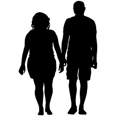 Image showing Silhouette man and woman walking hand in hand