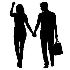 Image showing Silhouette man and woman walking hand in hand