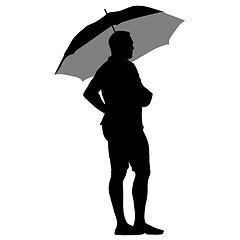 Image showing Black silhouettes of men under the umbrella