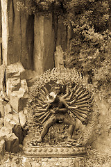 Image showing Tantric Deities statue in Ritual Embrace located in a mountain g