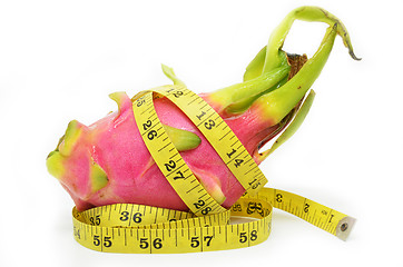 Image showing Dragon fruit and measure tape