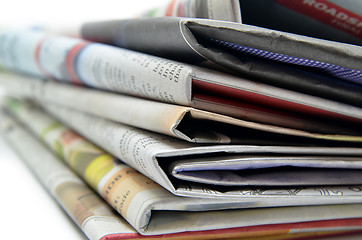 Image showing Newspapers folded and stacked