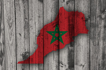 Image showing Map and flag of Morocco on weathered wood