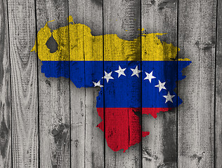 Image showing Map and flag of Venezuela on weathered wood