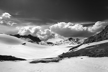 Image showing Black and white view on snow plateau with footpath