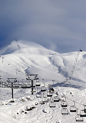 Image showing Ski slope and ropeways in evening