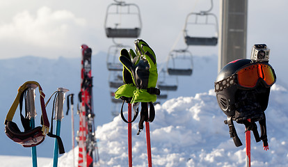 Image showing Protective sports equipment on ski poles at ski resort