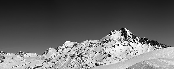 Image showing Panoramic view on off-piste slope and mount Kazbek at sun winter