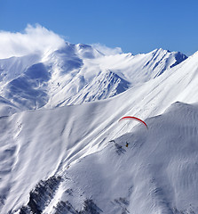Image showing Speed flying in snow winter mountains