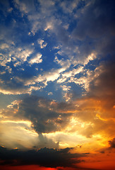 Image showing Multicolor sunset sky with clouds and sun rays