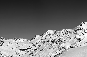 Image showing Black and white panoramic view on off-piste slope and snow mount