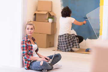 Image showing Happy couple doing home renovations