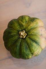 Image showing pumpkin on a wooden table