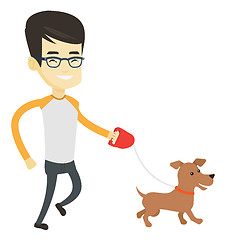 Image showing Young man walking with his dog.