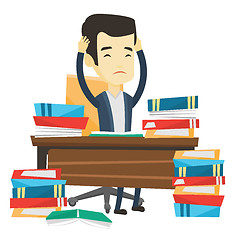 Image showing Student sitting at the table with piles of books.