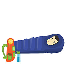 Image showing Man sleeping in sleeping bag in the mountains.