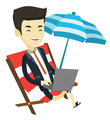 Image showing Business man working on laptop at the beach.