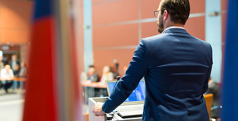 Image showing Public speaker giving talk at Business Event.