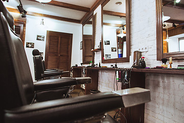 Image showing Vintage chairs in barbershop