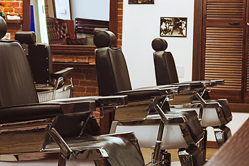 Image showing Vintage chairs in barbershop