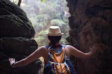 Image showing Woman among hills in rainforest