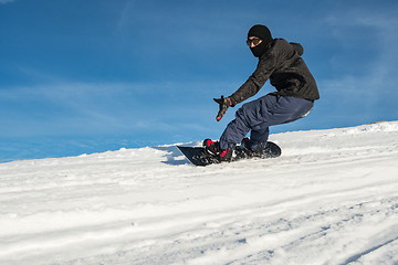 Image showing Snowboard freerider in the mountains