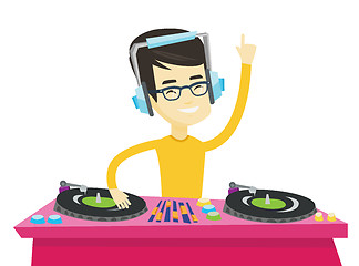 Image showing DJ mixing music on turntables vector illustration.