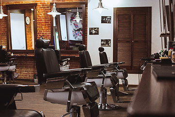 Image showing Vintage chairs in barbershop