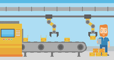 Image showing Robotic arm working on production line.