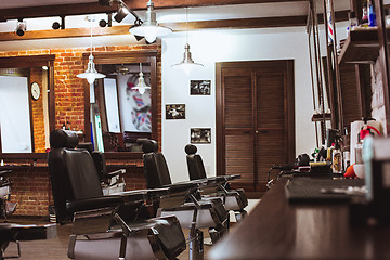 Image showing Vintage chairs in barbershop