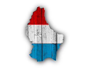 Image showing Map and flag of Luxembourg on weathered wood