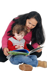Image showing Nanny read book to little boy.  