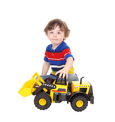 Image showing Three year old boy with his toy.
