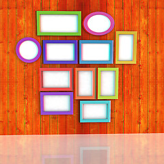 Image showing Mock up picture frames on wood wall. 3d illustration. Anaglyph. 