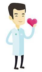 Image showing Doctor cardiologist holding heart.