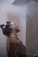 Image showing African American woman in the shower