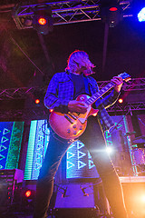 Image showing The blur silhouette of rock musician at abstract rock concert