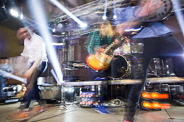 Image showing The blur silhouette of rock musician at abstract rock concert