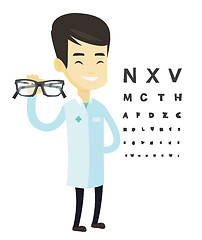 Image showing Professional ophthalmologist holding eyeglasses.