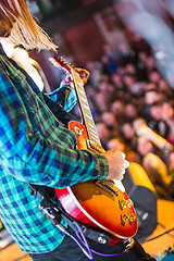 Image showing The blur silhouette of rock musician at abstract rock concert