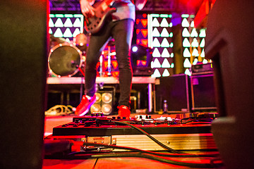 Image showing The blur silhouette of rock musician at abstract rock concert