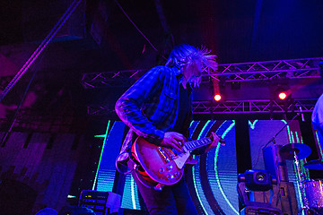 Image showing The blur silhouette of rock musician at abstract rock concert