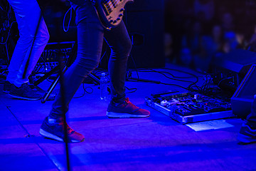 Image showing The blur silhouette of rock musician at abstract rock concert