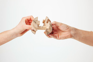 Image showing puzzle in hand isolated on white background