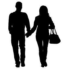 Image showing Silhouette man and woman walking hand in hand