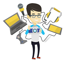 Image showing Young man surrounded with his gadgets.