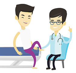 Image showing Gym doctor checking ankle of a patient.