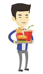 Image showing Man holding tray full of fast food.