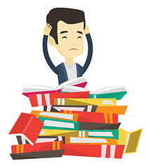 Image showing Student sitting in huge pile of books.