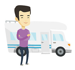 Image showing Man standing in front of motor home.